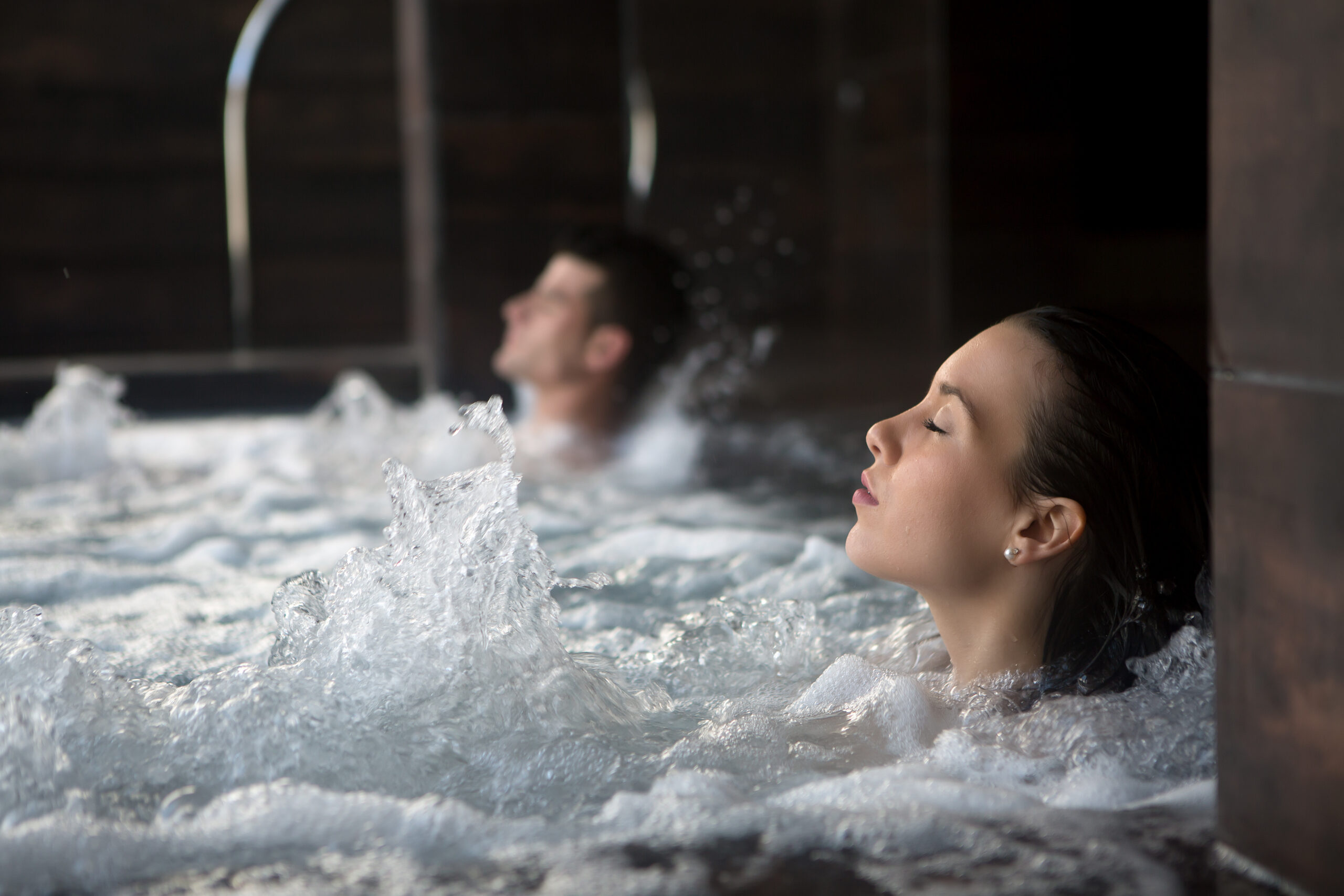 Couple relaxing in spa Couple relaxing in spa
